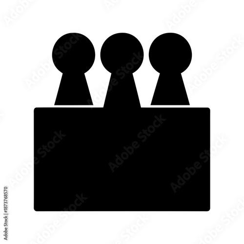 Three Simple Black Game Pieces Sitting on Top of a Black Board