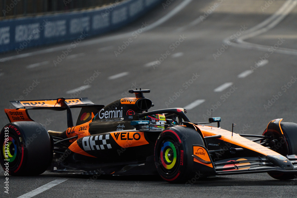 Naklejka premium BAKU, AZERBAIJAN - SEPTEMBER 20, 2025: Lando Norris drives the McLaren Formula 1 car at the Baku City Circuit during the 2025 Azerbaijan Grand Prix