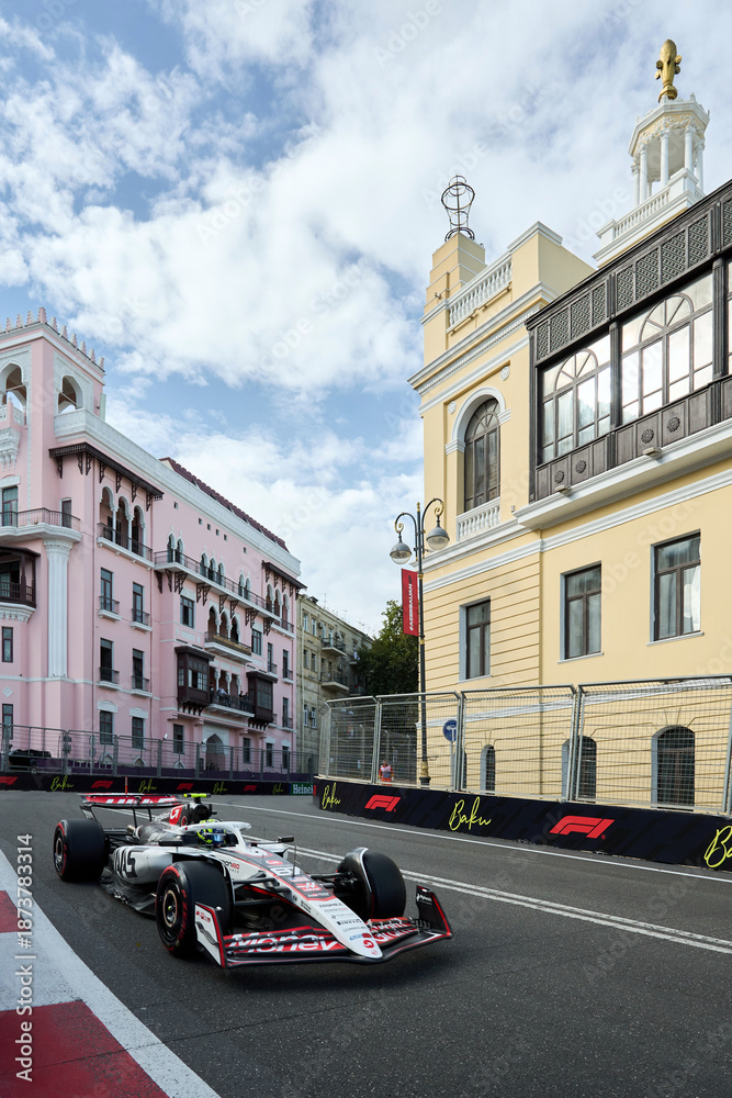 Fototapeta premium SEPTEMBER 20, 2025: Nico Hülkenberg drives the 27 MoneyGram Haas F1 Team VF-24 during a session of the Azerbaijan Grand Prix at the Baku City Circuit.