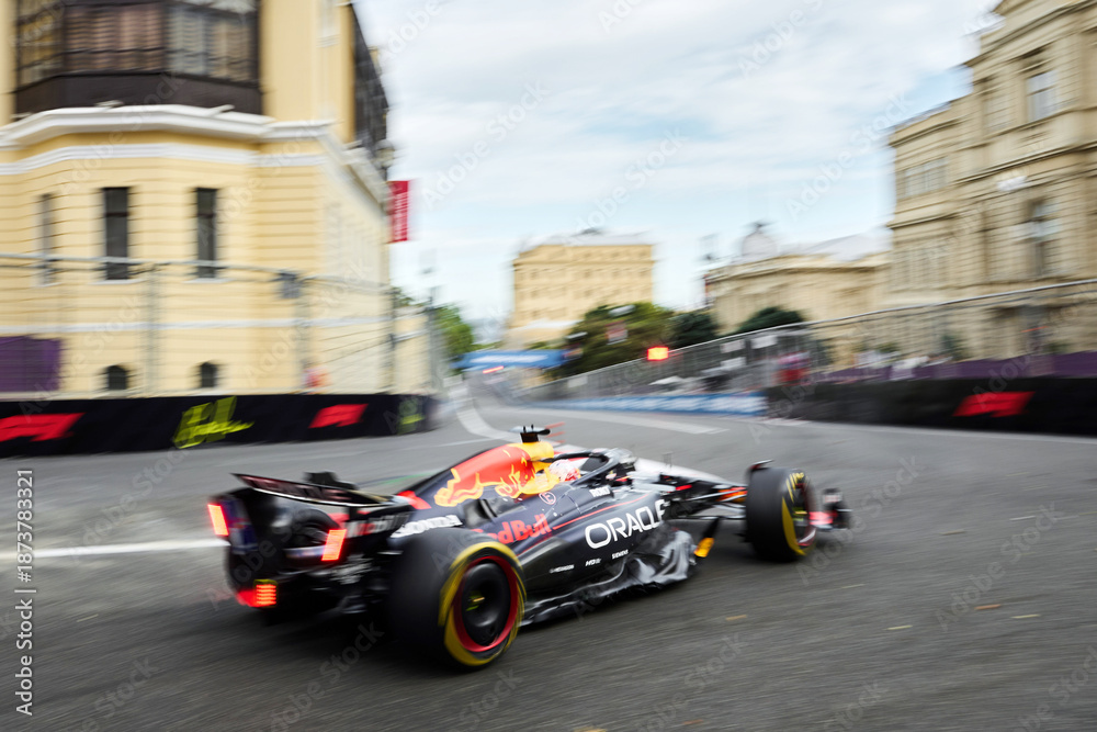 Naklejka premium BAKU, AZERBAIJAN - SEPTEMBER 20, 2025: Sergio Perez drives the #11 Oracle Red Bull Racing RB20 during the Azerbaijan Grand Prix on the Baku City Circuit