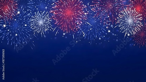 A vibrant display of red white and blue fireworks illuminates a dark celebratory night sky