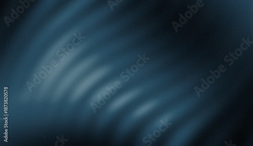 Abstract deep navy blue wavy light beams on dark background. Modern blurred motion texture with soft rhythmic curves, sleek atmospheric glow, and elegant cinematic digital backdrop.
