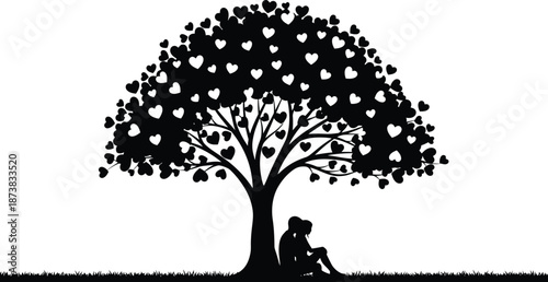 A person sits under a tree with heart-shaped leaves in a peaceful outdoor setting.