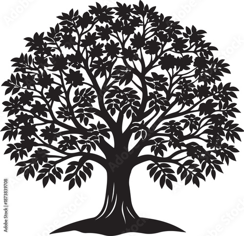 Large mighty tree with an abundance of leaves and exposed roots, full silhouette