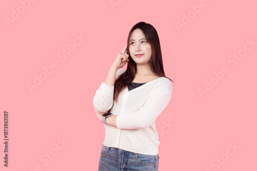 Bild auf Leinwand Asian woman, Thai cute model teen girl standing isolated with Thinking guess tho