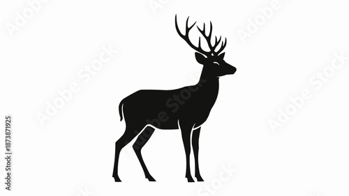 Black silhouette of a majestic stag with large antlers standing proudly.
