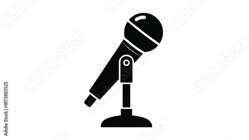 A simple black microphone on a stand a striking visual silhouette