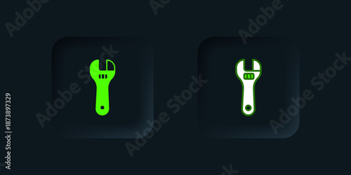 Green Adjustable wrench icon isolated on black background. Black square button. Vector