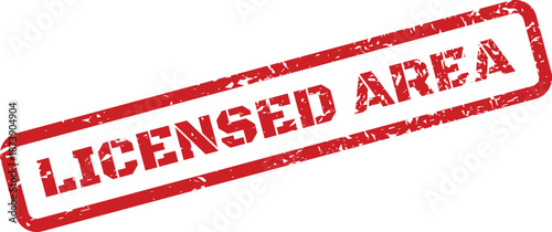 A specific red rectangular rubber stamp showing the text Licensed Area for restricted access