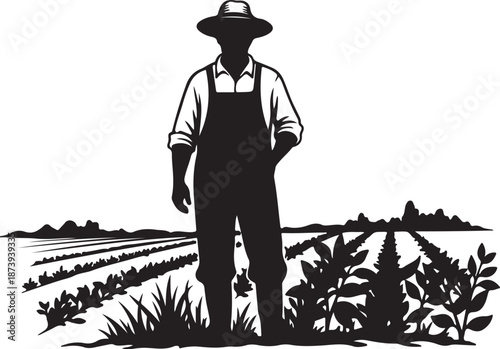 Farmer standing in a field with crops and hat