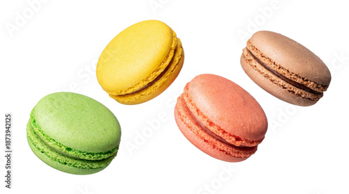 фотографія four colorful macarons arranged in a playful composition against a stark transparent background, highlighting their vibrant hues and delicate textures, perfect for dessert and confectionery themes