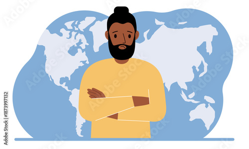 A man stands in front of a world map with his arms crossed.