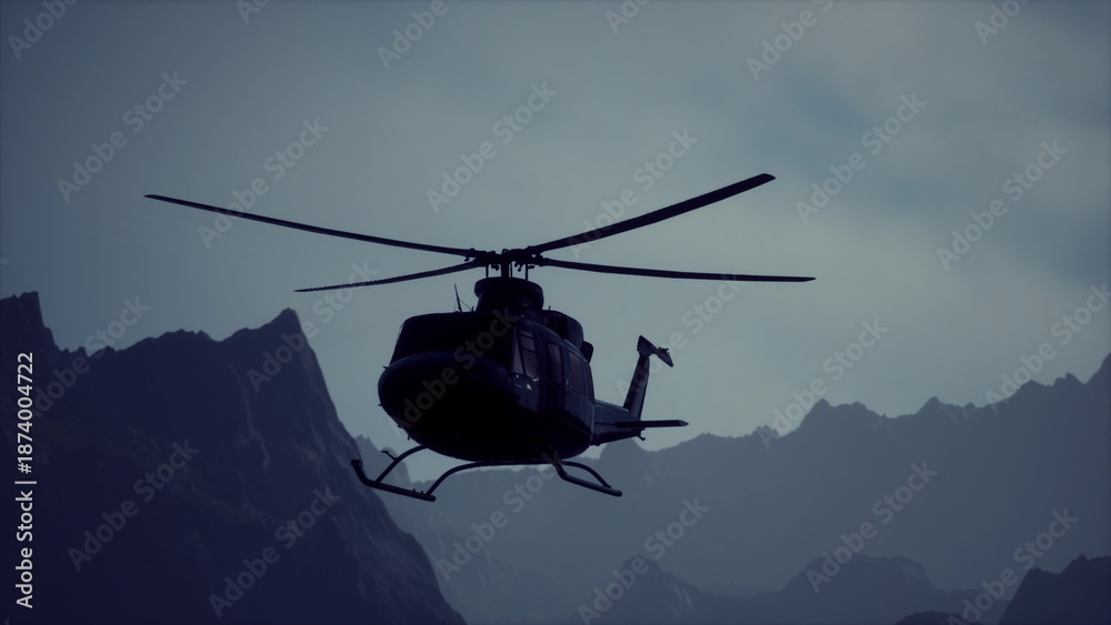 Fototapeta premium A helicopter hovers amid jagged mountain peaks under an overcast sky at dusk. The scene captures a moment of adventure and exploration in a remote area filled with natural beauty.