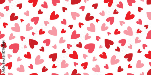 Seamless pattern with coquette hand-drawn pink bows with striped pattern and tiny hearts for feminine branding, stationery, and textile design. Vector illustration.