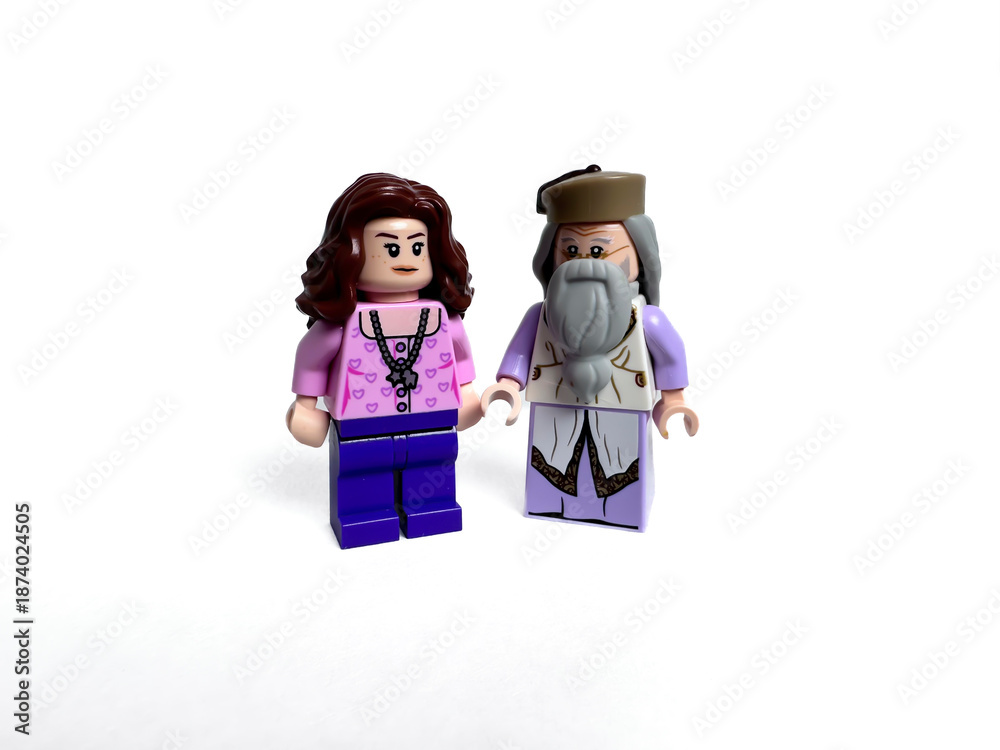 Fototapeta premium Lego Miniature Figures of Young Woman and Elderly Man in Casual Attire, Perfect for Collectors and Playsets