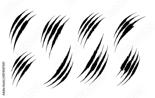Collection of black claw marks and scratches white background animal wild