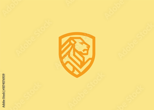 A simple geometric lion within a shield symbolizing protection strength leadership honor bravery and powerful defense identity