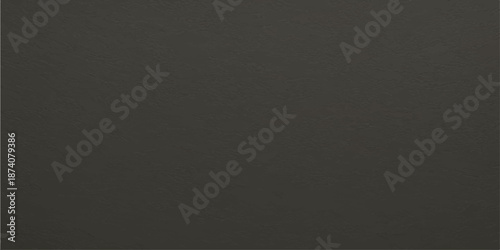 Black chalkboard texture background with a dark rough surface pattern suitable for wallpaper and design