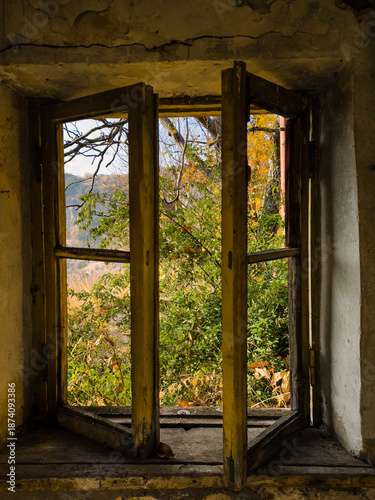 Picturesque view of mountain village from open window of rural house in Yerevan, Armenia. High quality photo