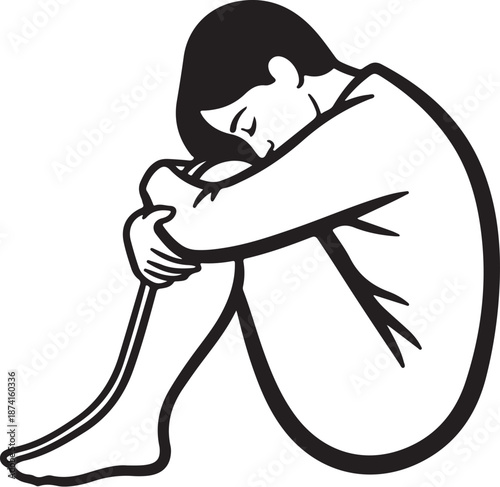 Sad woman sitting alone in a contemplative pose crying