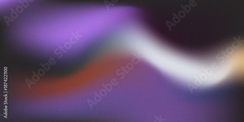 Abstract blurry image featuring vibrant purple white and orange color blends