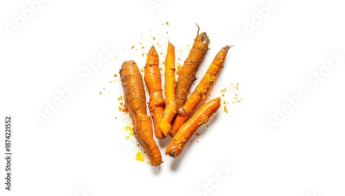 Fresh turmeric roots on a w...