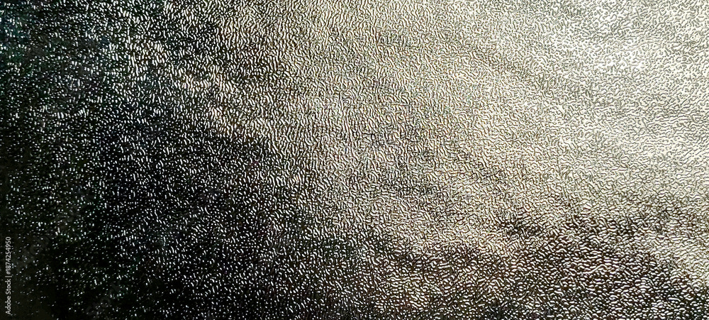 Fototapeta premium Silver Foil Texture Background with Distressed Metallic Surface and Subtle Light Reflection