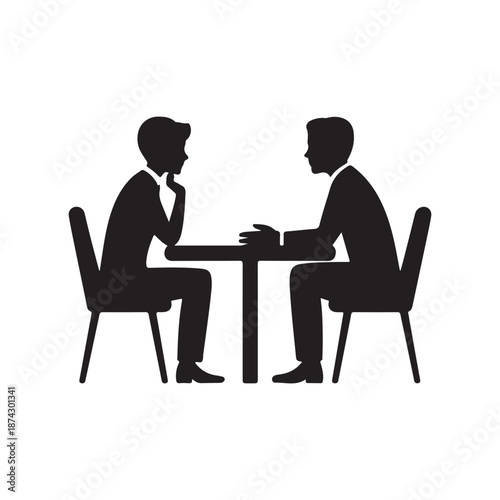 Corporate Business Meeting Silhouette of Two Men Talking at a Desk