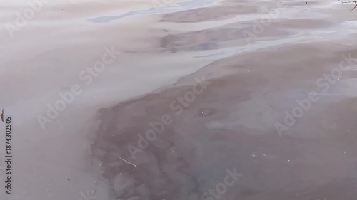 Calm Shallow Water Over Wet Sand. Peaceful Coastal Nature Footage