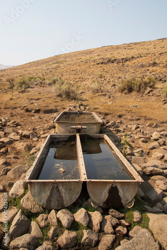Photography Water troughs at Antelope Springs in the Smoke Creek Desert of Lassen County CA provide water for livestock and wildlife