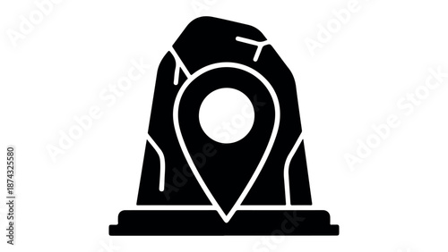 Black map pin icon on a rocky pedestal standing tall.