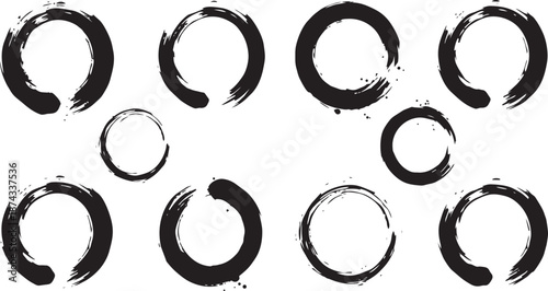 Set of black Zen Enso circle ink brush strokes. Hand-drawn Japanese Sumi-e style round frames and grunge borders.