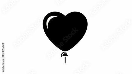 Black Heart Shaped Balloon Floating Isolated On White Background.