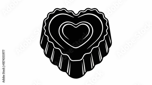 Black heart shaped cake mold isolated on white background.