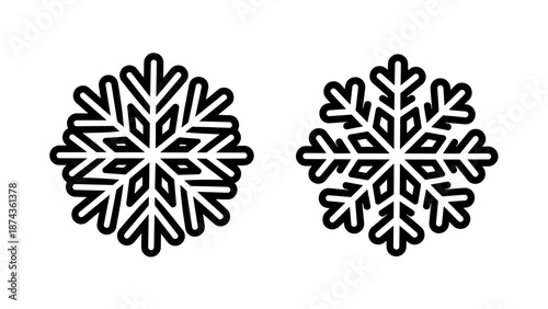 Detailed line art icons of two distinct symmetrical snowflake crystal designs