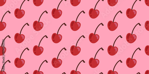 Valentine’s Day seamless cherry pattern on pink background with scattered red hearts and stems. Sweet romantic vibe for wrapping paper, greeting cards, textiles, packaging and web banners in february.