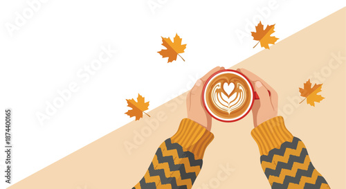 Hands holding a latte with latte art in a cozy sweater surrounded by autumn leaves for a warm seasonal beverage concept