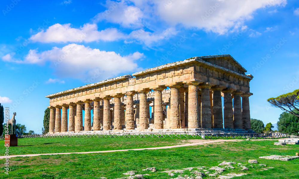 Fototapeta premium The ancient Greek temple of Hera in Paestum, Italy. Famous archaeological site of Paestum, Magna Graecia, ancient ruins.