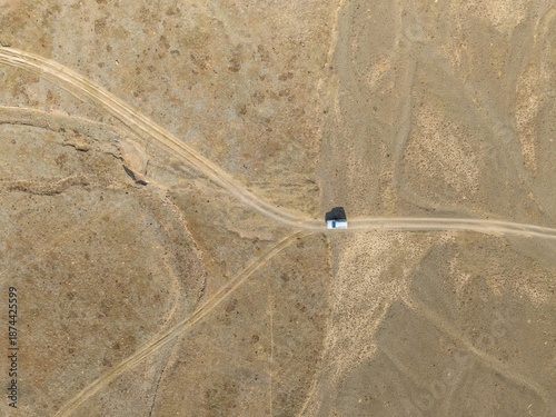 Aerial view, Vast empty landscape, Road and off-road vehicle, Top down view, Two paths divide, Symbolic for decisions, Moldo Too mountains, Naryn region, Kyrgyzstan