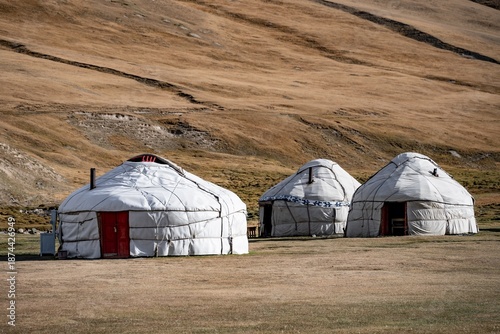 Yurts with yellow hills, Atbashy district in the Naryn region, Kyrgyzstan