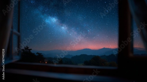 A breathtaking view of the starry night sky seen through a window