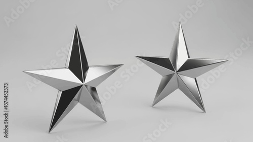 Two Shiny Silver Metal 3D Stars on White Background
