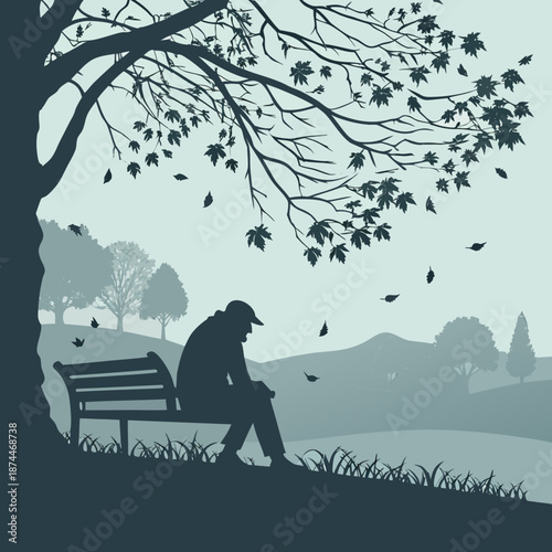 Man sitting alone on bench under tree with falling leaves