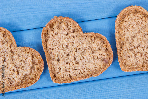 Bread in shape of heart baked from whole grain flour