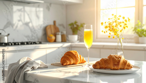 sunlight croissants, a champagne glass with mimosa, and chair