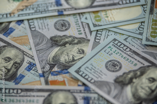 Hundred dollar banknotes spread symbol of wealth and finance