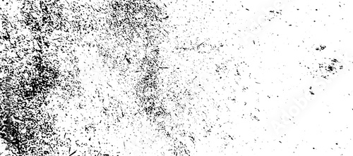 A distressed monochromatic texture displaying chaotic dark grunge elements against a bright white background. vector