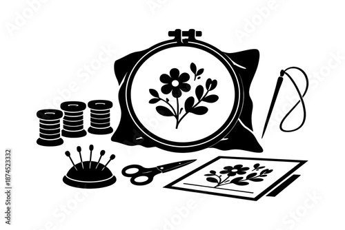 Silhouette of embroidery tools with floral design: sewing needle, thread, scissors, and patterns