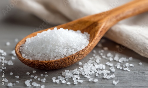 Coarse Sea Salt Crystals in Wooden Spoon