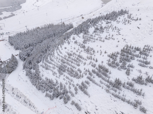 Odemis valley village and fields under winter snow